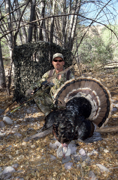 Hunter with Dead Turkey Hunter with Dead Turkey